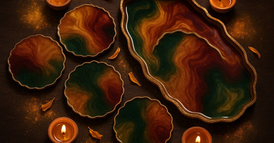 Handmade Diwali resin coasters and tray in gold, orange, emerald and maroon mica colours with diya and marigold styling