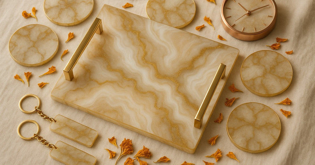 Personalized resin wedding gifts including a custom marble tray, coasters, name keychains, and a resin clock arranged on a cream linen surface with dried flowers