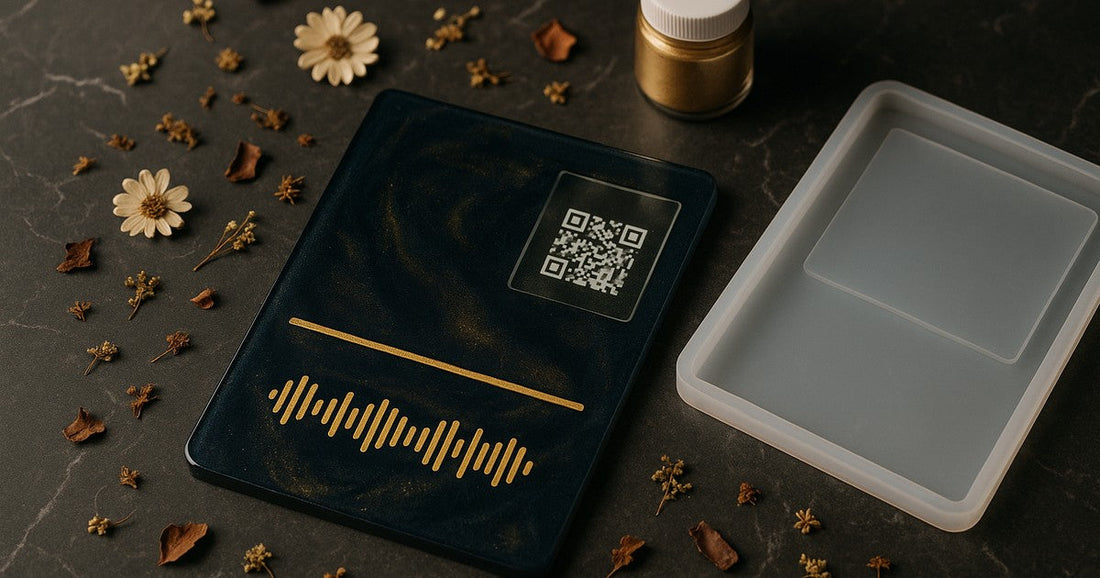 Finished resin Spotify plaque in navy and gold with embedded QR code, displayed on dark marble with craft materials
