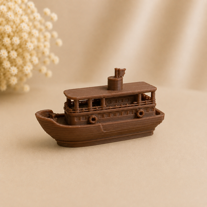 Handcrafted traditional Assam river ferry boat miniature showpiece displayed on a wooden surface