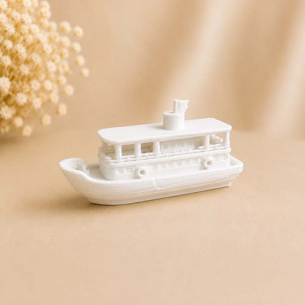 Handcrafted traditional Assam river ferry boat miniature showpiece displayed on a wooden surface