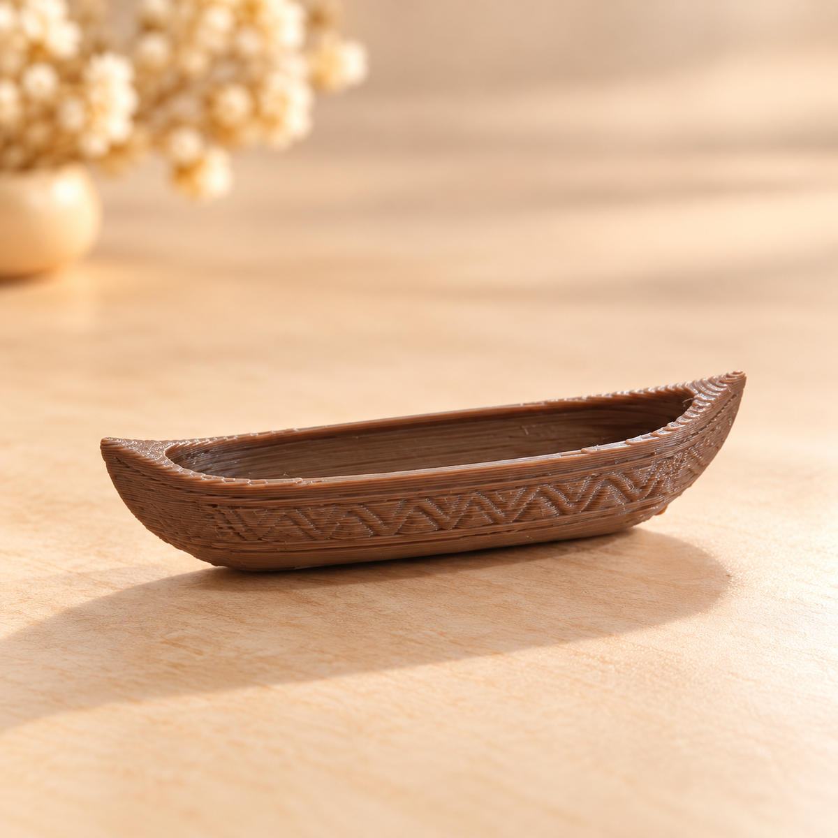 3D printed empty canoe boat miniature placed inside a resin river art tray showing floating effect