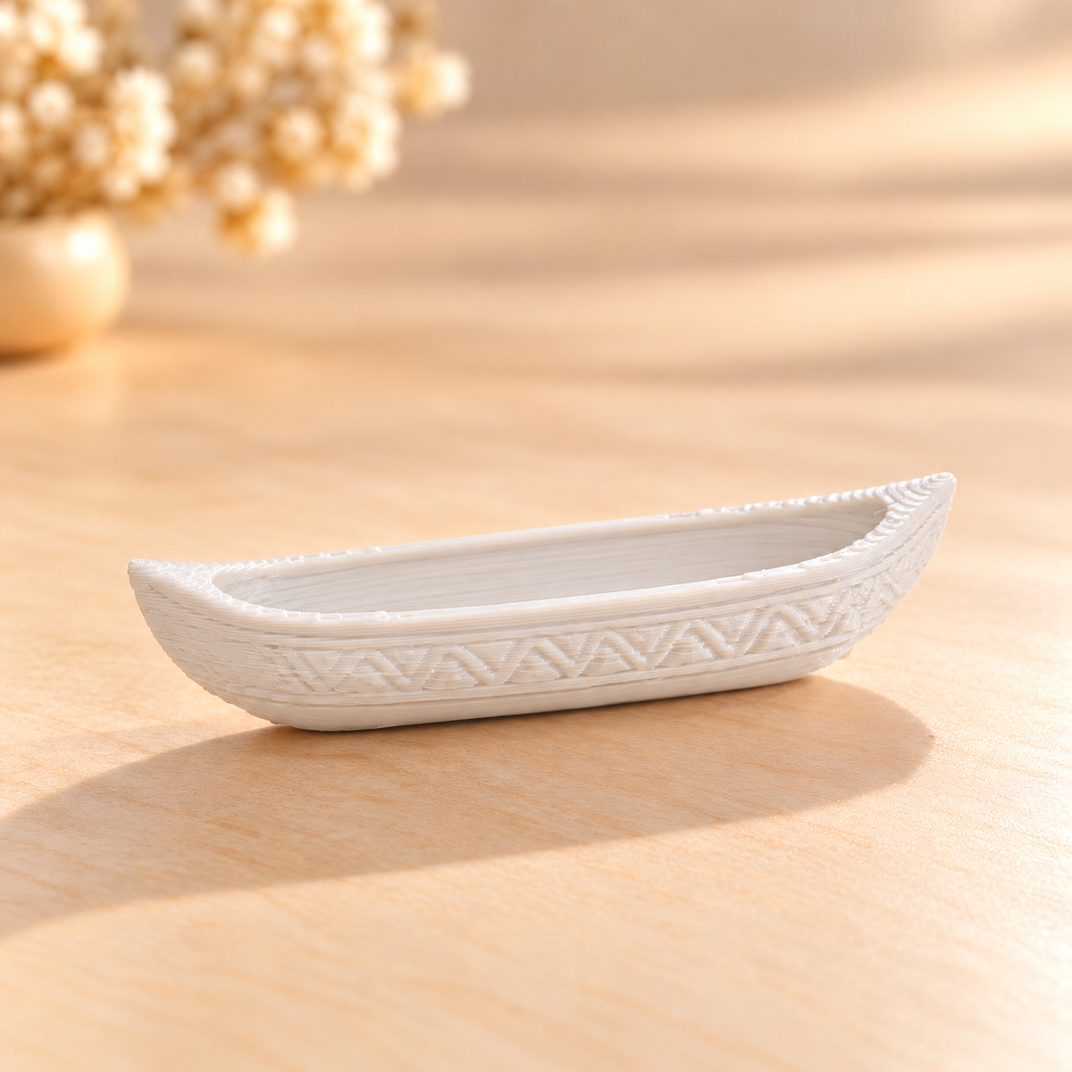 3D printed empty canoe boat miniature placed inside a resin river art tray showing floating effect