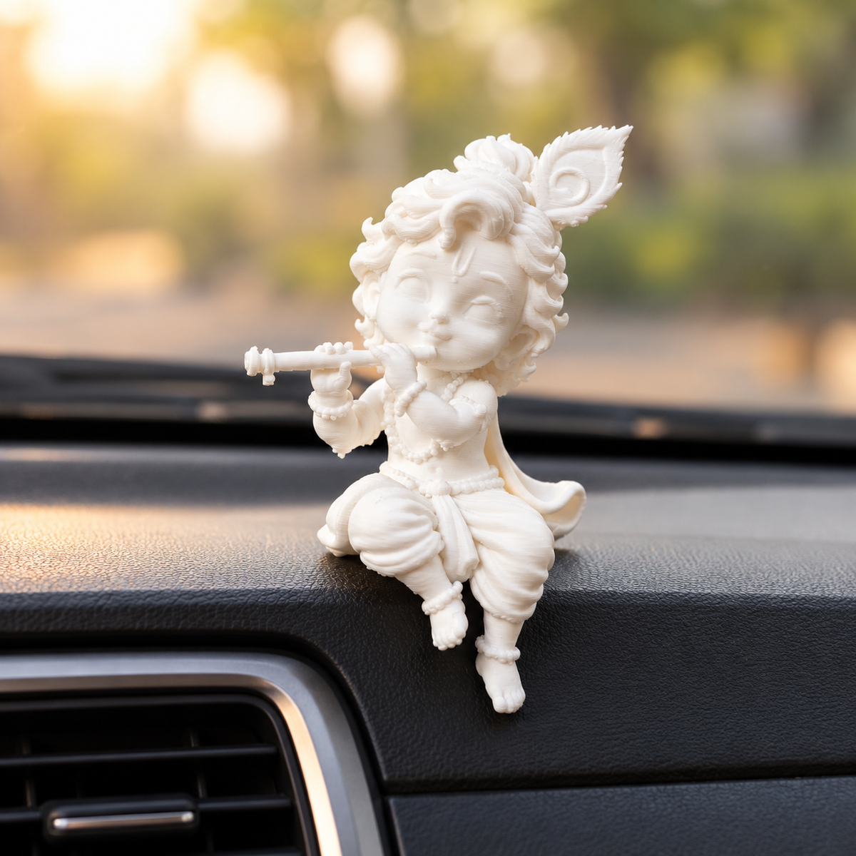 White 3D printed sitting Bal Krishna playing flute idol for car dashboard and desk decor by Shrebhavi