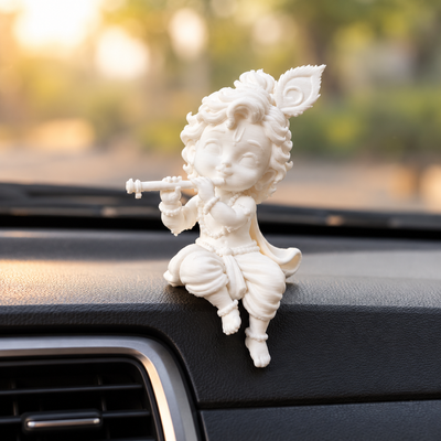 White 3D printed sitting Bal Krishna playing flute idol for car dashboard and desk decor by Shrebhavi