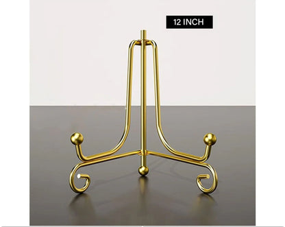 Gold metal folding stand styled with resin art piece for home decor display